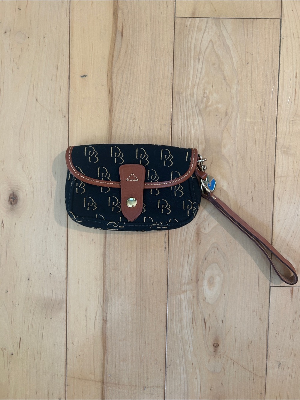 Dooney & Bourke Black and Tan Canvas Logo Wristlet
